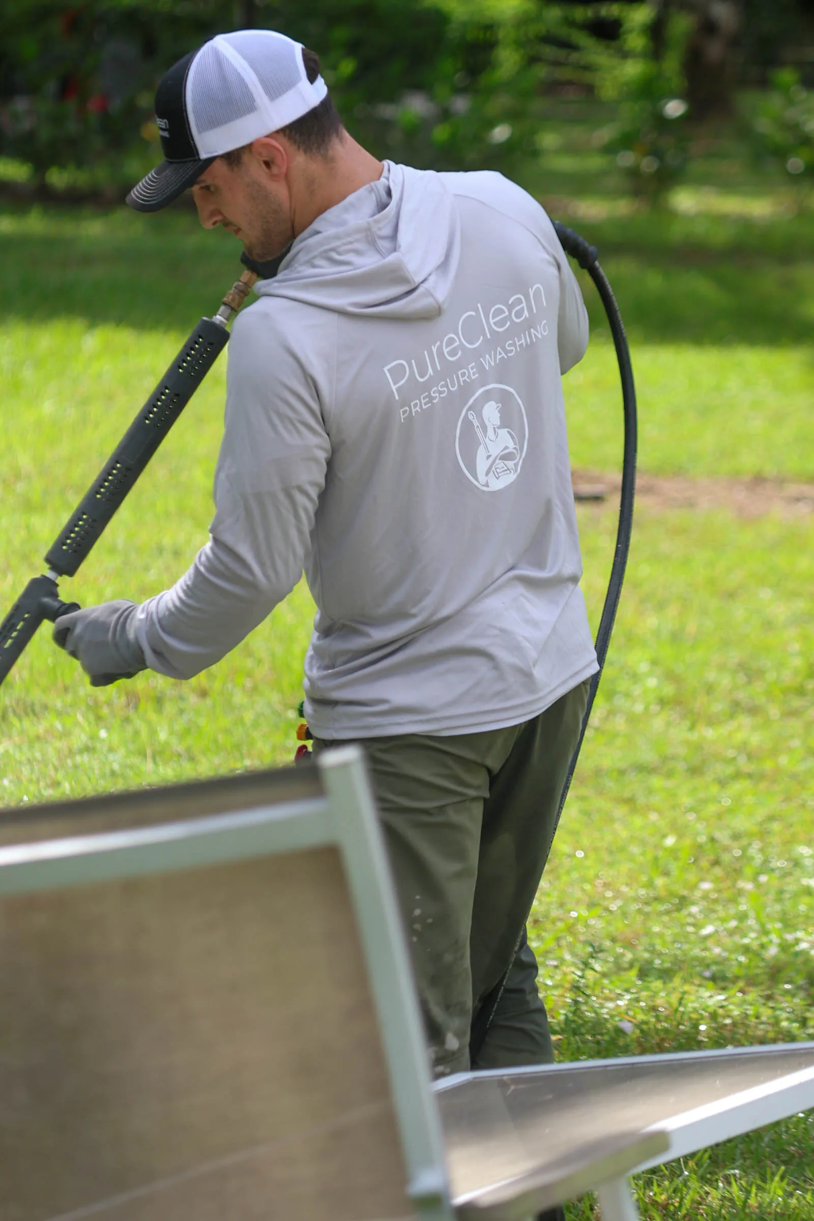 Michael coiling hose after a job