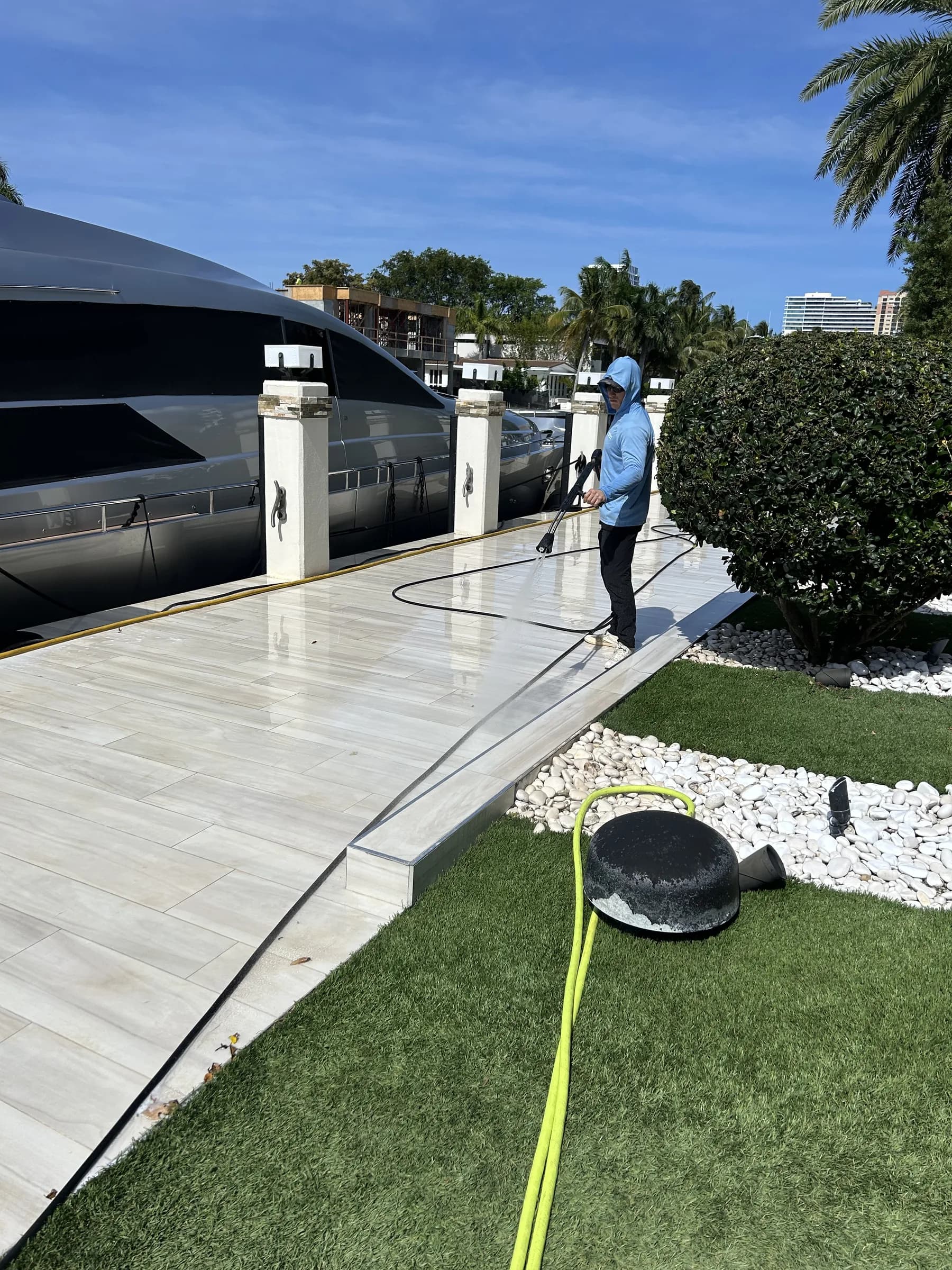 Cleaned travertine driveway at a waterfront home