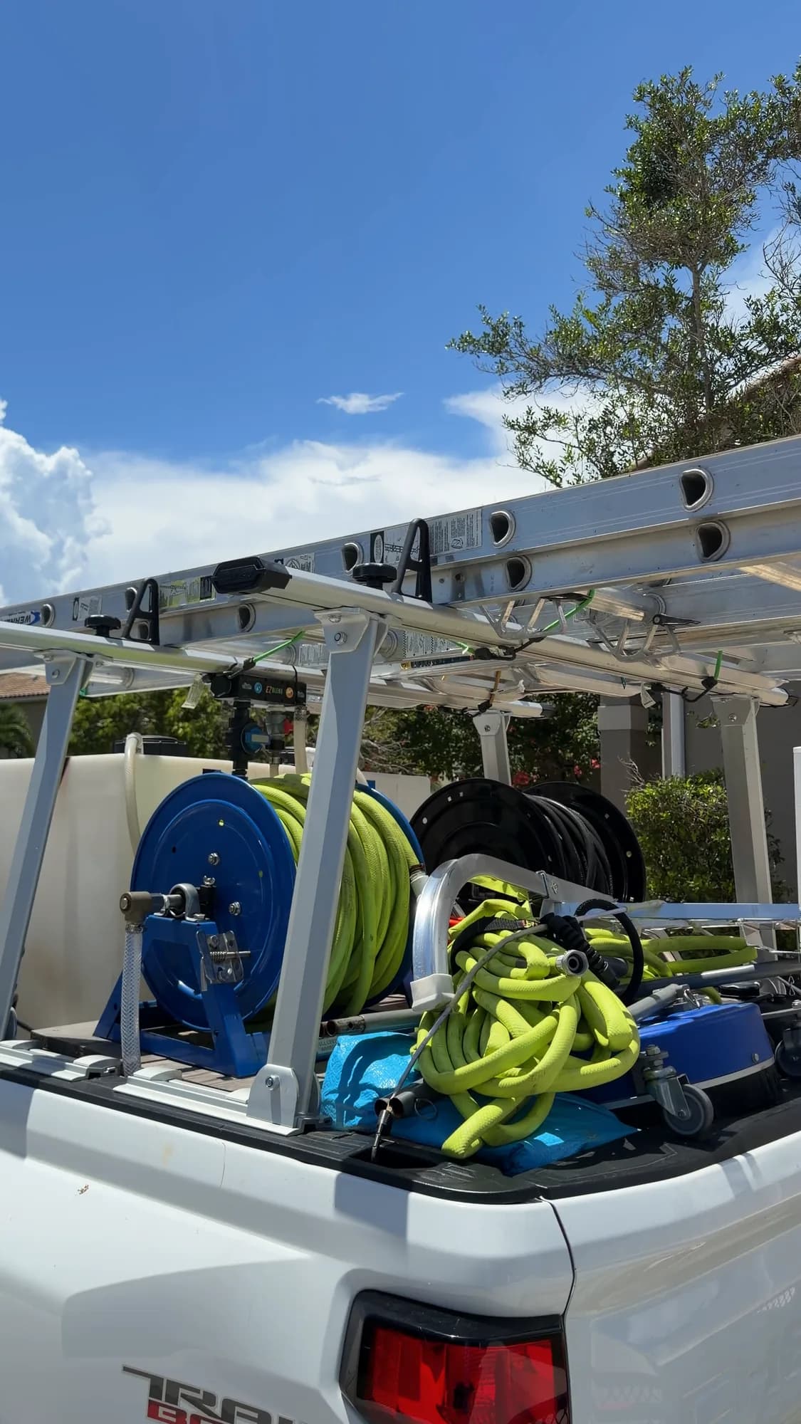 The Pure Clean truck loaded with ladders and hose